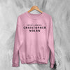 Christopher Nolan Credit Sweatshirt Directed By Christopher Nolan Shirt The Odyssey Crewneck - Light Pink - WorldWideShirt